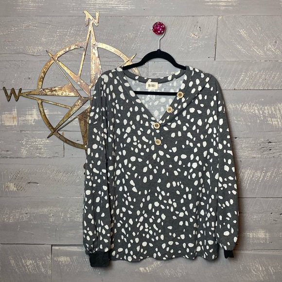 Bundle of 3 boutique brand tops plus one mystery item. - Picture 2 of 10